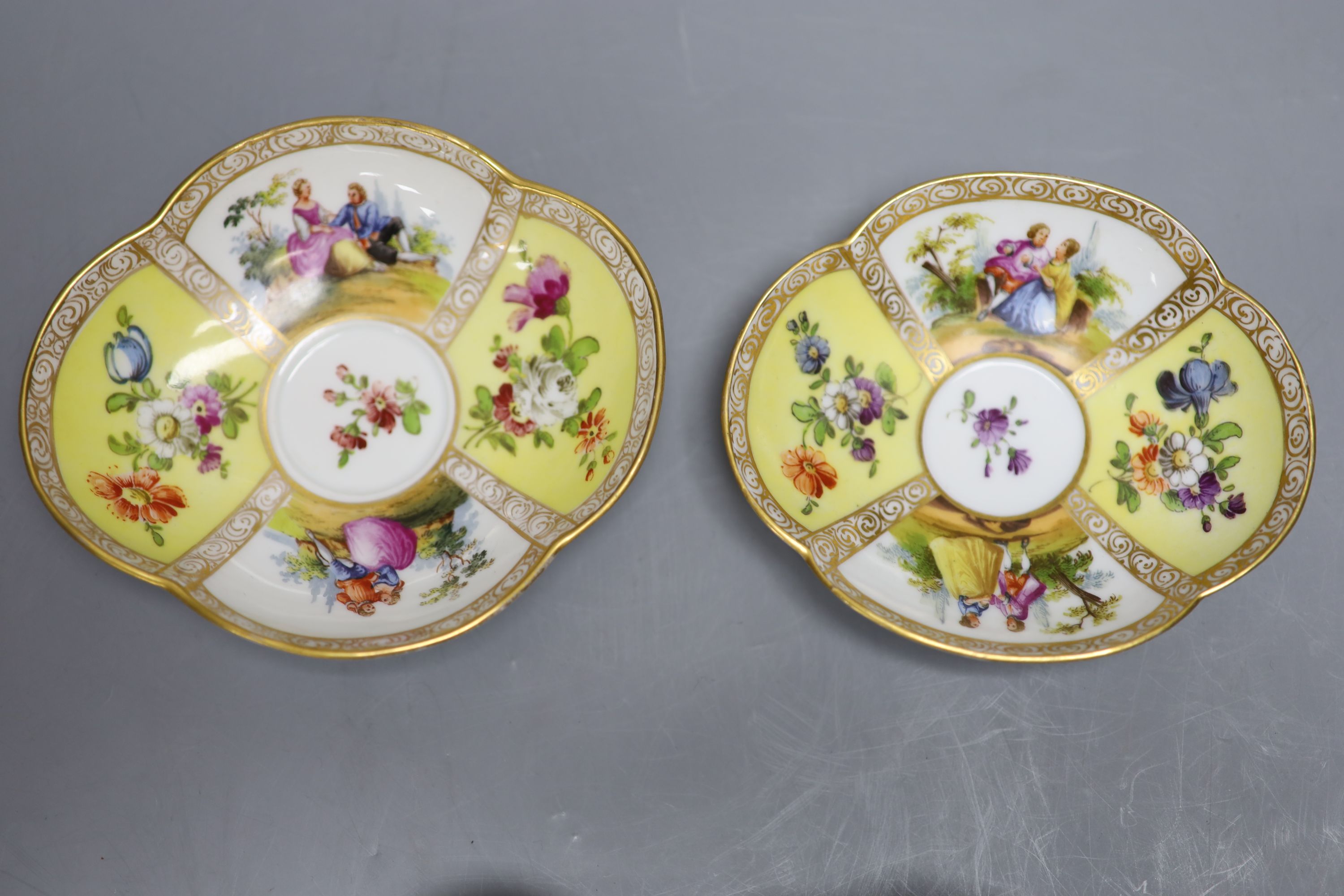 Two Dresden cups, one Dresden saucer and a Meissen saucer